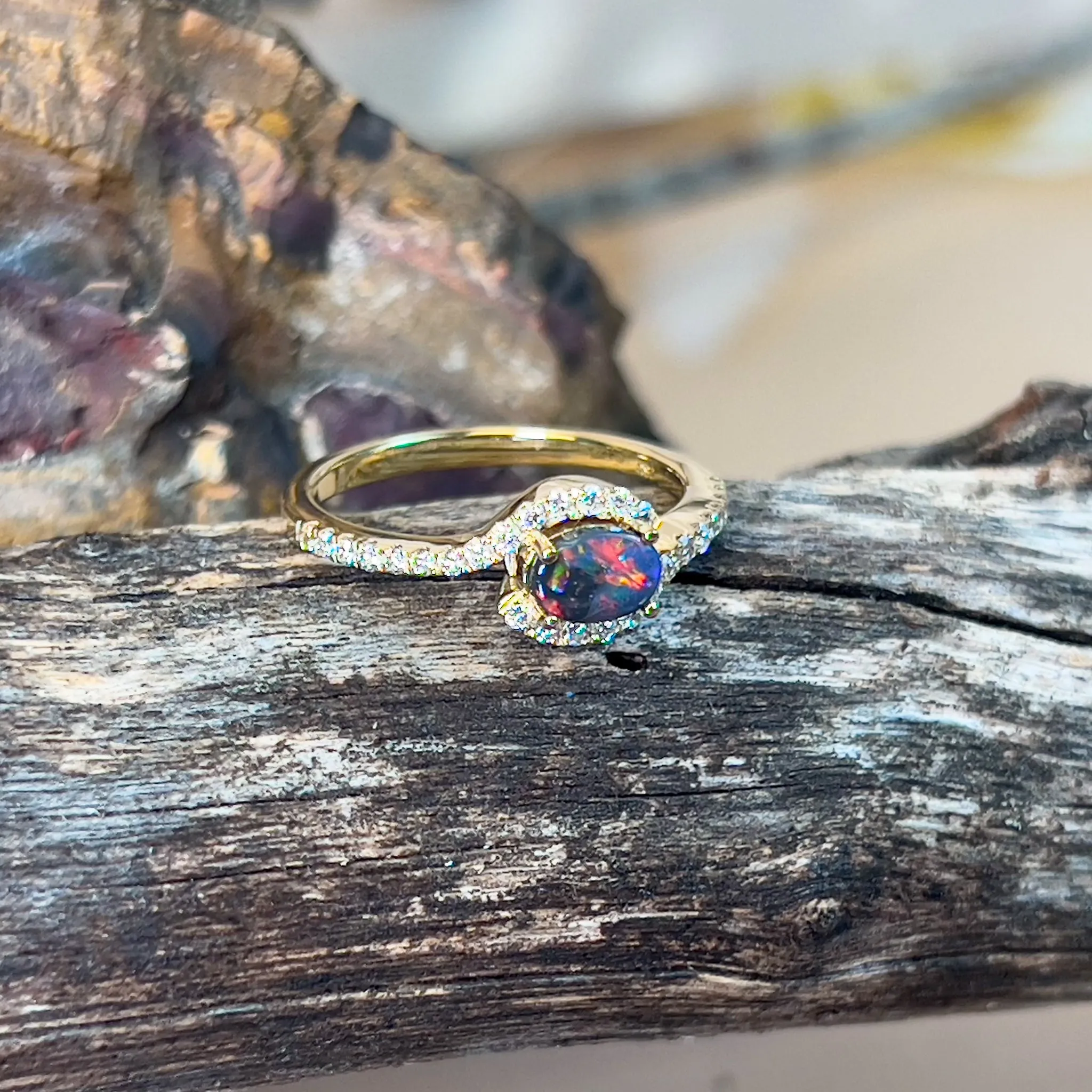 18kt Yellow Gold Black Opal 0.26ct and Diamond cross over ring