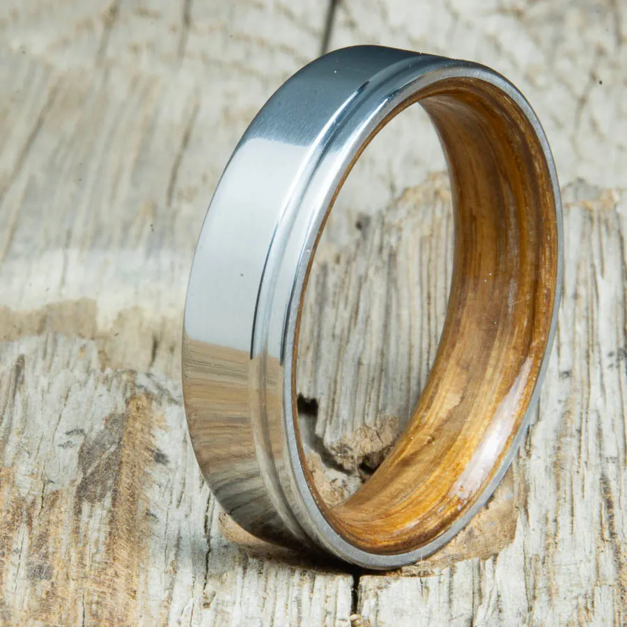 Bentwood whiskey barrel wood and 6mm polished offset groove titanium wedding band