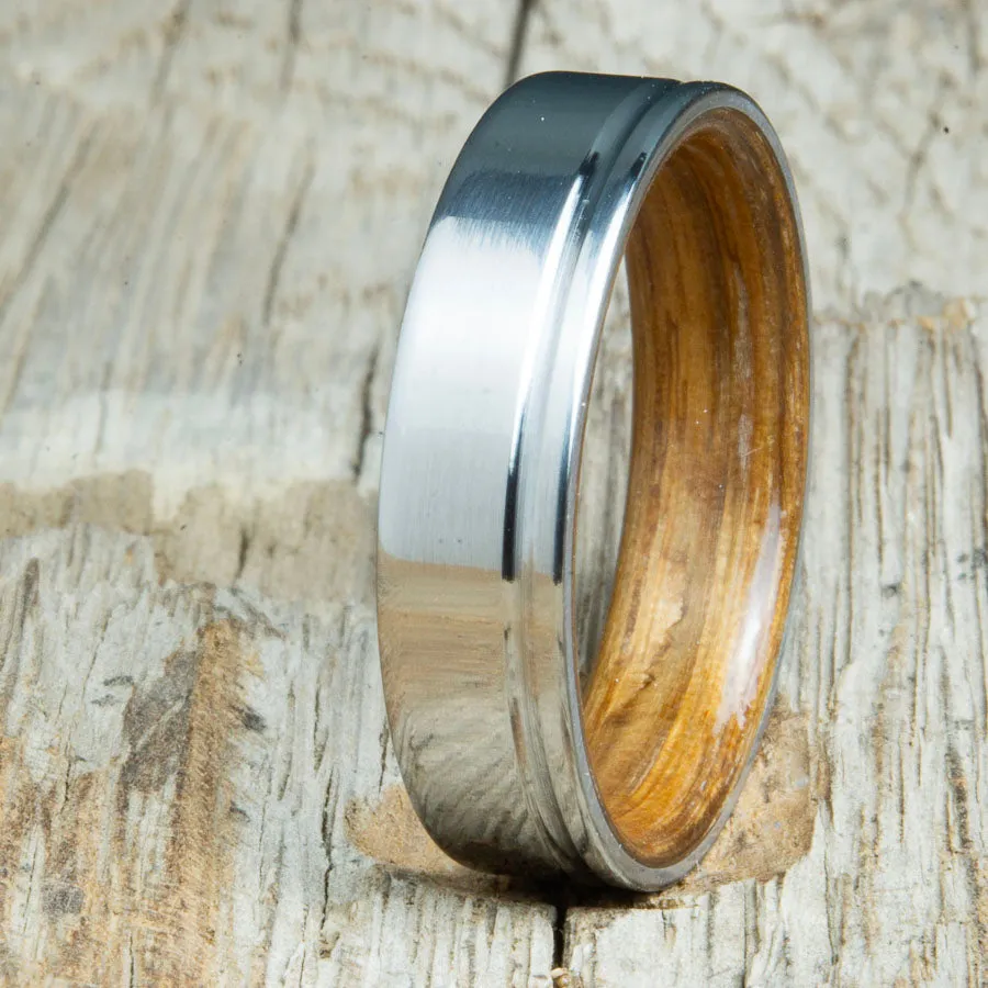 Bentwood whiskey barrel wood and 6mm polished offset groove titanium wedding band