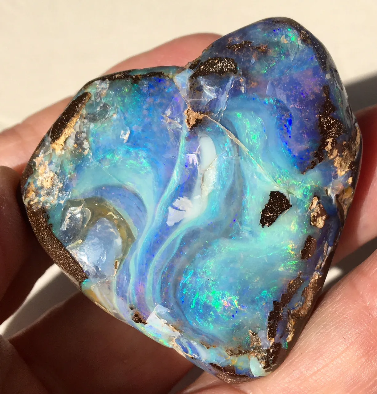 Green Violet boulder opal polished speciman