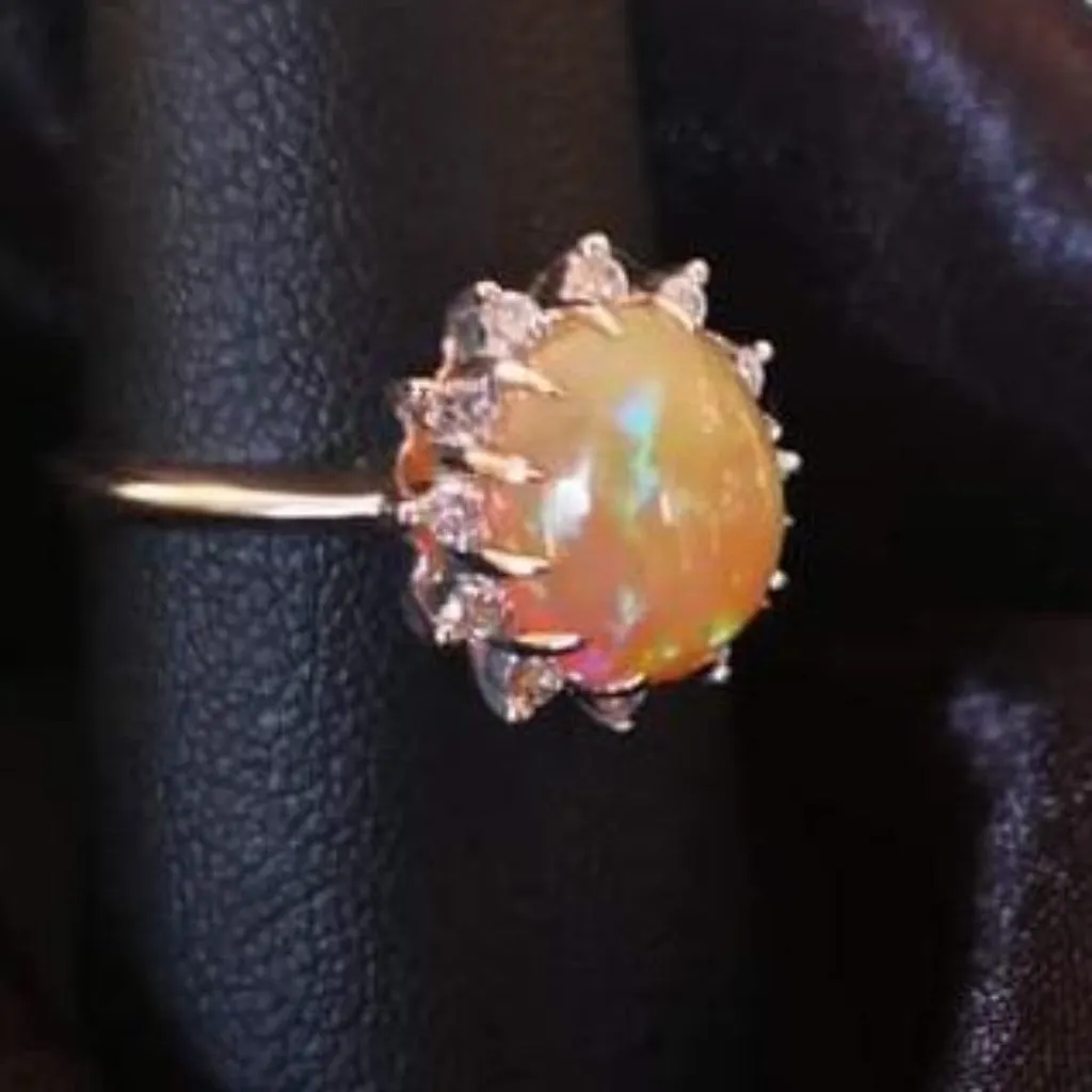 Jelly Opal and .25ctw Diamond 14k White Gold.