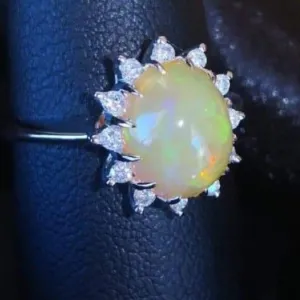 Jelly Opal and .25ctw Diamond 14k White Gold.