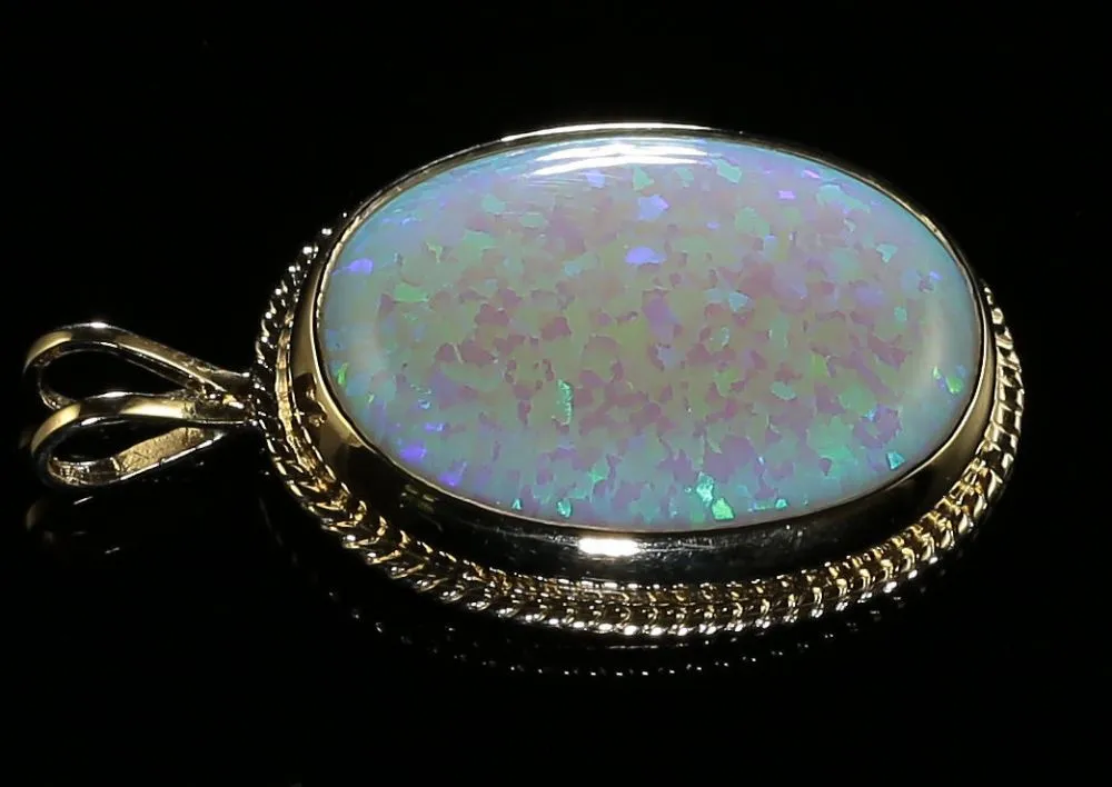 Opal Gold Pendant 30Ct In Size
