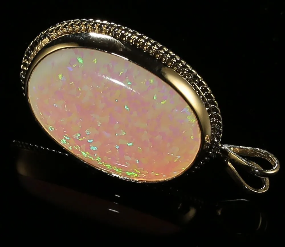 Opal Gold Pendant 30Ct In Size
