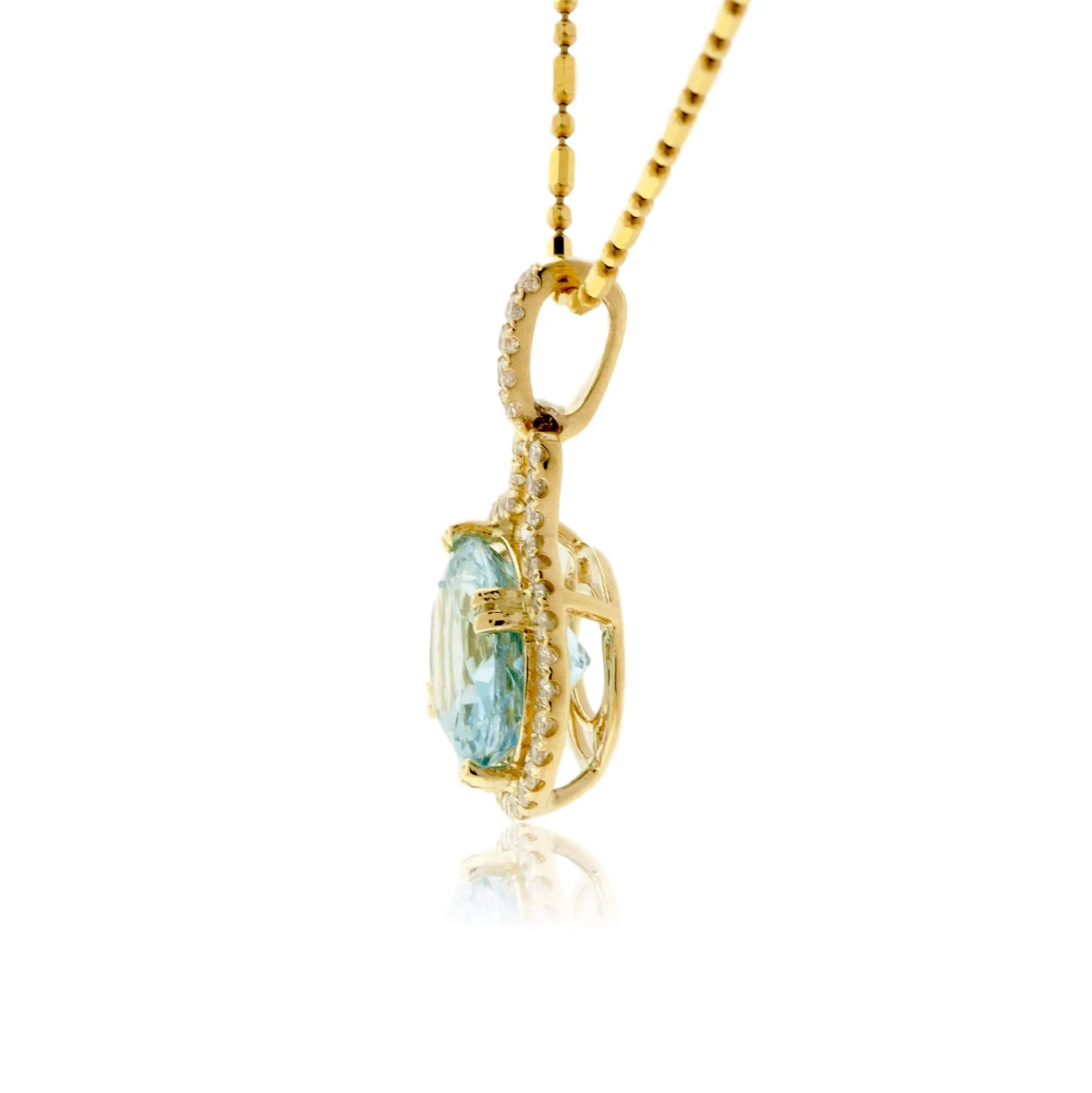Oval Aquamarine on Side & Diamond Halo Pendant