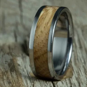 Wedding ring with Whiskey barrel wood and polished titanium